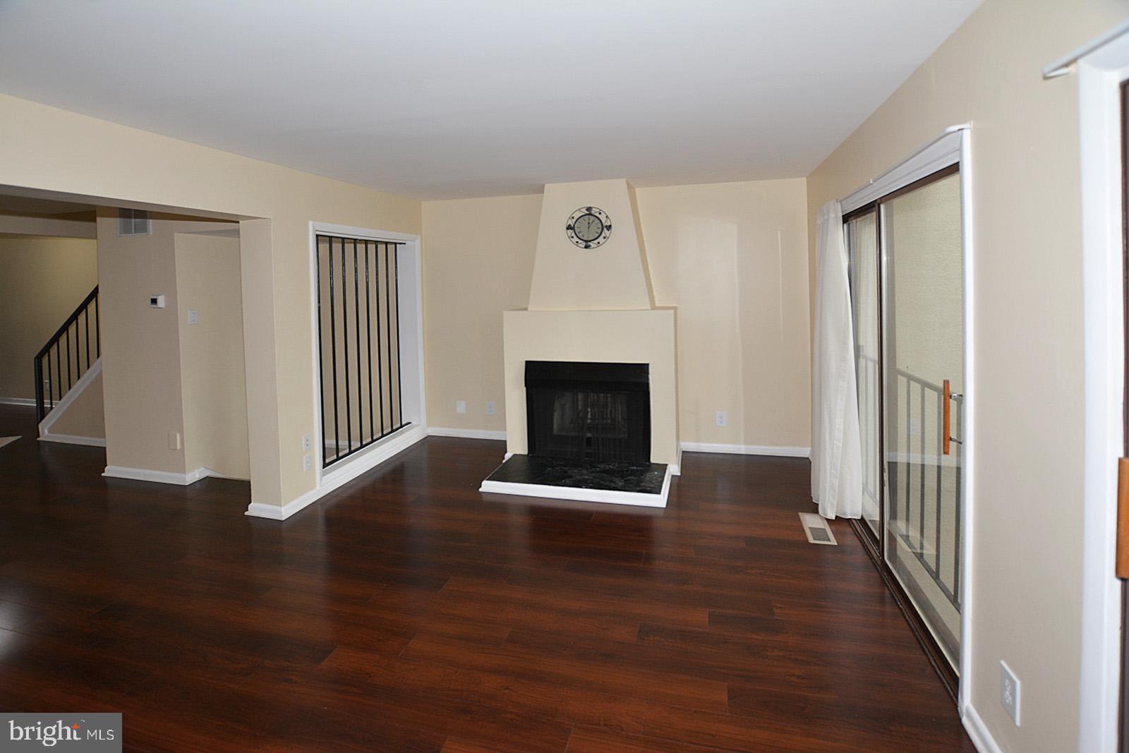 1639 Valencia Way Reston, VA 20190 - Photo 10 of 28 Living room with inviting Fireplace