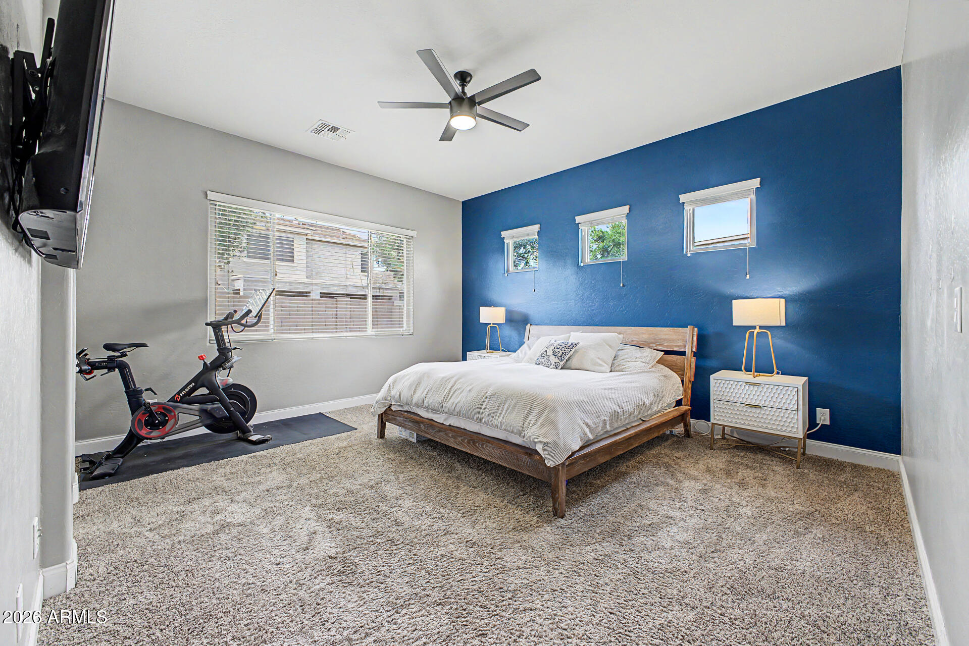 4272 East Buckboard Road Gilbert, AZ 85297 - Photo 19 of 37 a bedroom with a bed and a window