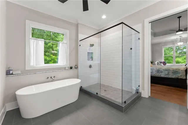 a view of a hallway with paintings on the wall