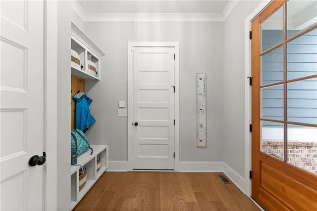 a white toilet sitting next to a shower curtain