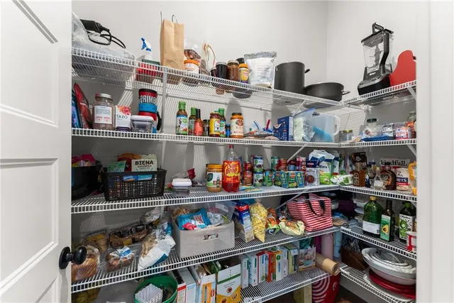 a bed room with a bed and a window