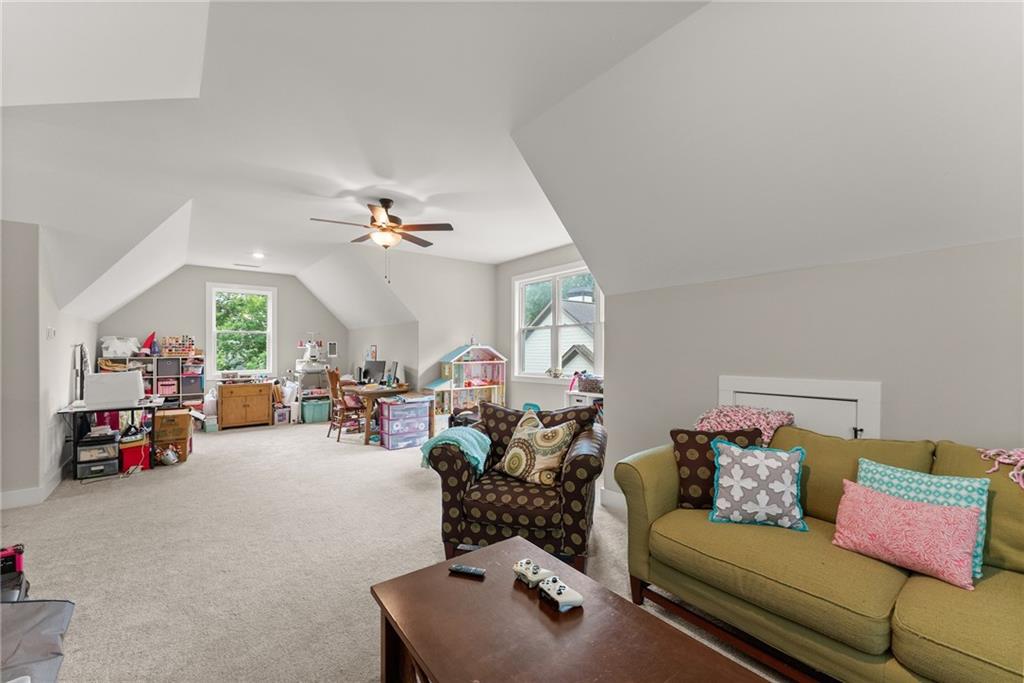 4847 Destitute Way Gainesville, GA 30506 - Photo 37 of 67 a living room with furniture and a lamp