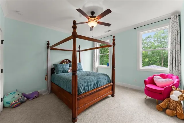 a front view of a house with swimming pool having outdoor seating