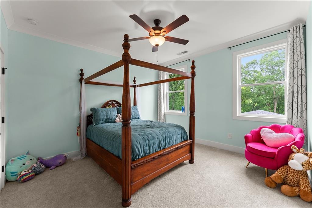 4847 Destitute Way Gainesville, GA 30506 - Photo 44 of 67 a bed room with a bed and a window