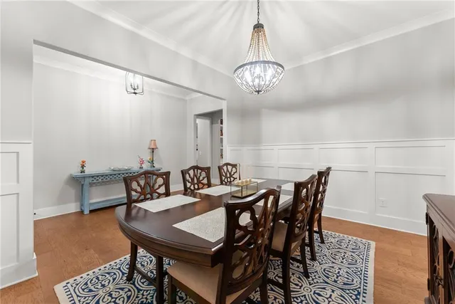 a living room with fireplace furniture and a flat screen tv