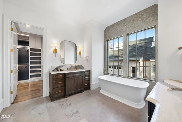 a view of a bathroom with a shower and a sink