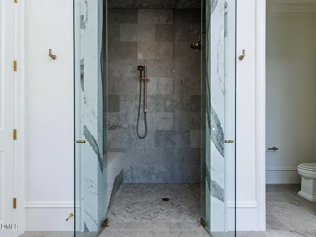 an empty room with windows and yard