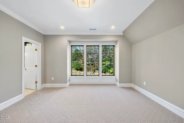 an empty room with windows