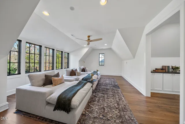 a bedroom with bed and a window