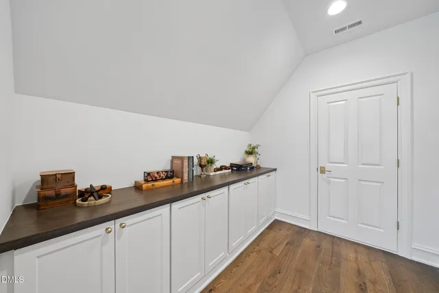 a bed room with a bed and a large window