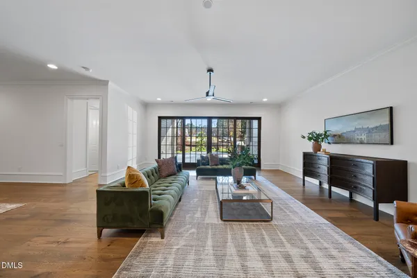 a bed room with a bed and a large window