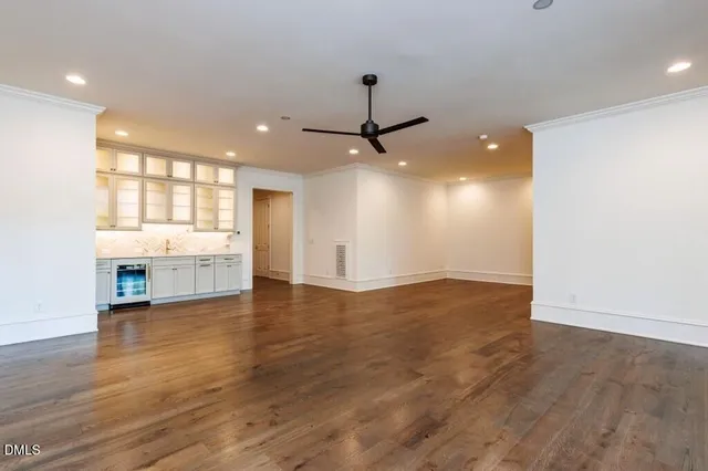 a view of a park with large trees