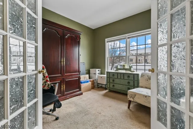 a room with furniture and a window