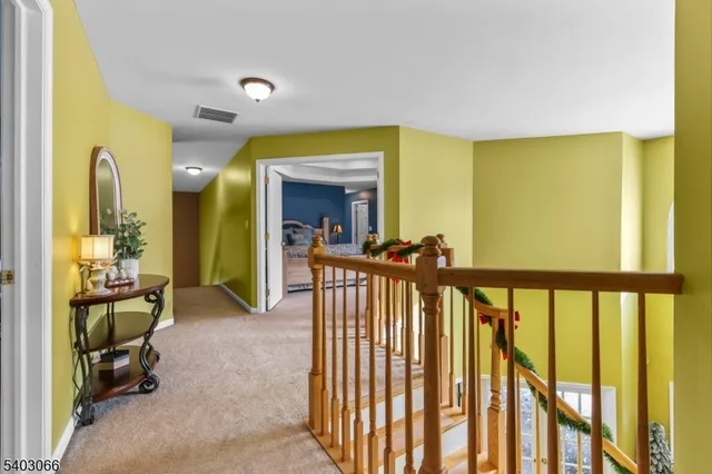 a view of a living room and a balcony