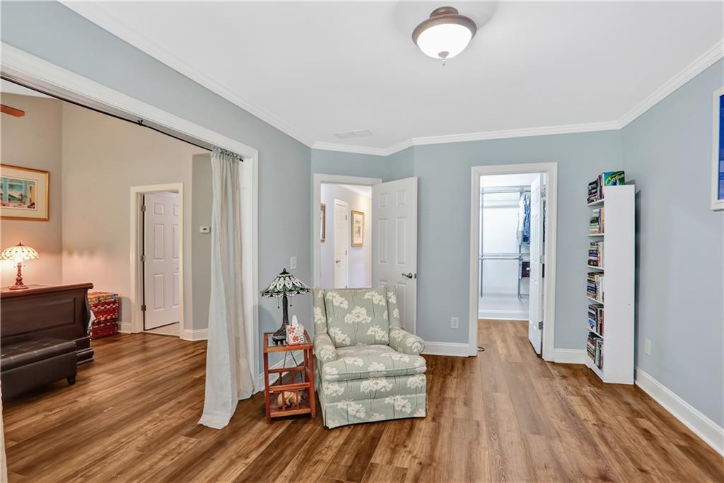 2444 Oak Grove Heights Decatur, GA 30033 - Photo 19 of 26 a living room with furniture and a wooden floor