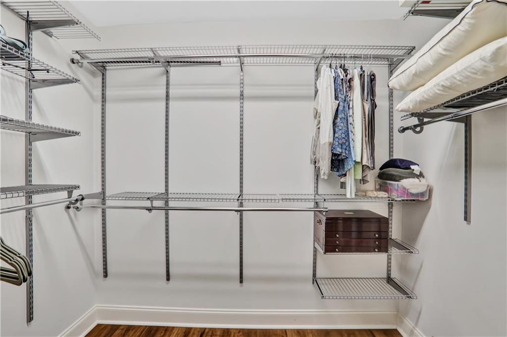 2444 Oak Grove Heights Decatur, GA 30033 - Photo 20 of 26 a view of walk in closet with clothes and shoes