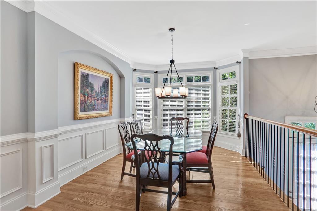 2444 Oak Grove Heights Decatur, GA 30033 - Photo 3 of 26 a view of a dining room with furniture window and wooden floor