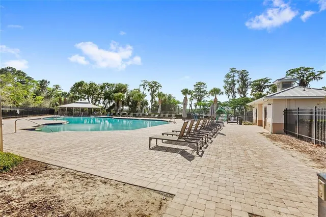a view of a lake with a sitting area