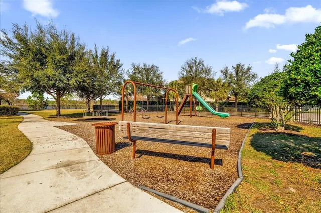 a view of a park with swings