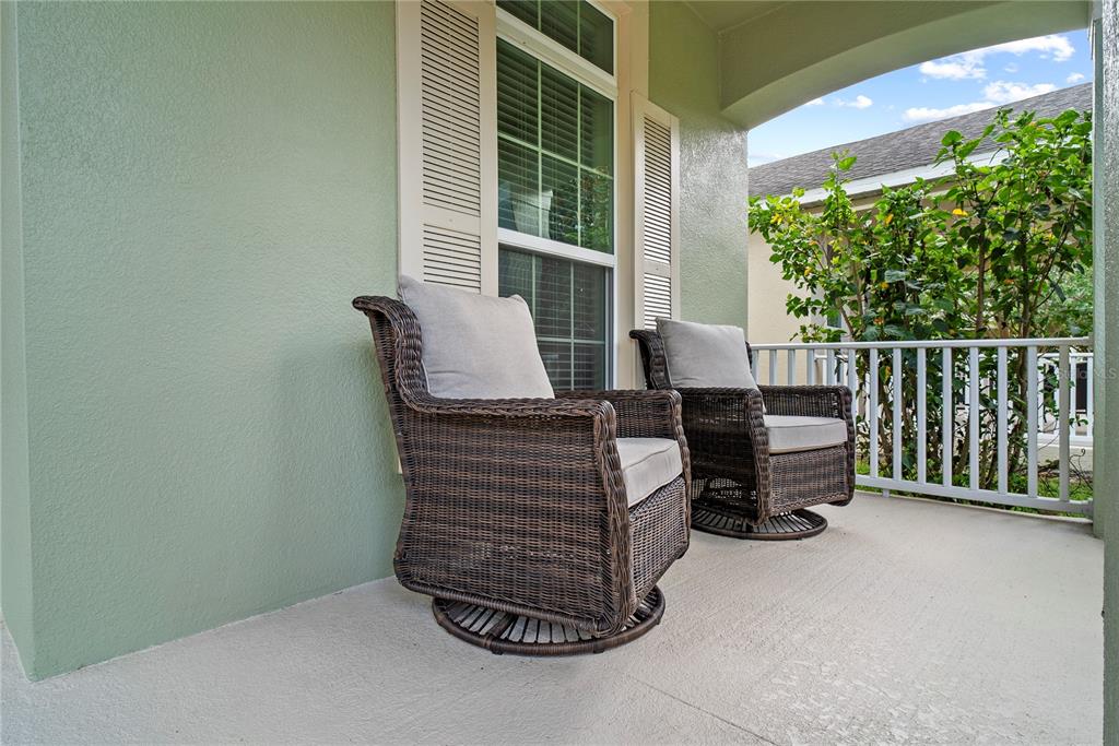 11922 Angle Pond Avenue Windermere, FL 34786 - Photo 6 of 45 a outdoor living space with furniture and a window