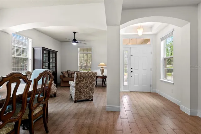 a view of a livingroom with furniture and window