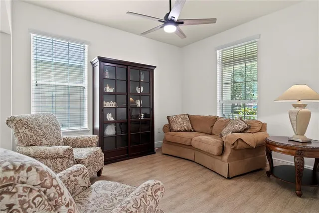 a living room with furniture and a window