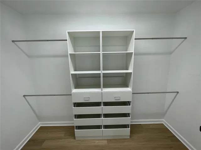 a view of an empty room with empty racks