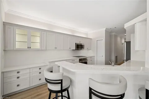 $599,000 | 13180 Hamilton Harbour Drive, Unit E1, Naples, FL 34110