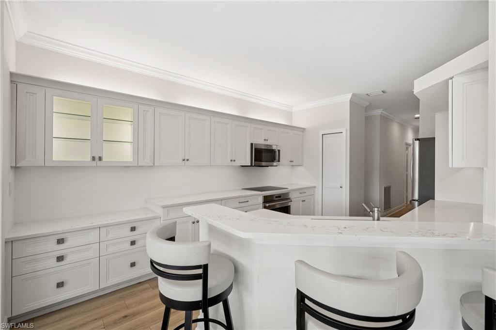 13180 Hamilton Harbour Drive, Unit E1 Naples, FL 34110 - Photo 12 of 30