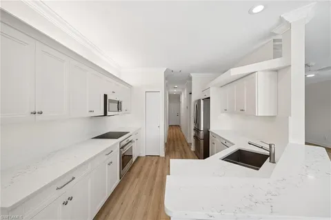 $599,000 | 13180 Hamilton Harbour Drive, Unit E1, Naples, FL 34110