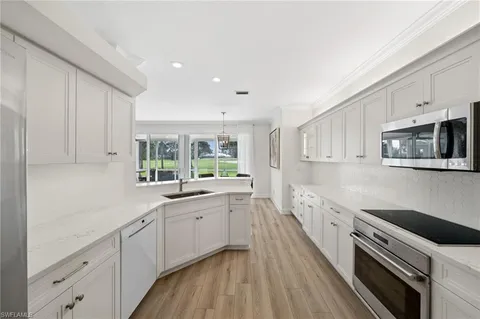 $599,000 | 13180 Hamilton Harbour Drive, Unit E1, Naples, FL 34110