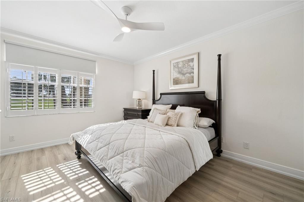 13180 Hamilton Harbour Drive, Unit E1 Naples, FL 34110 - Photo 16 of 30 Roomy Bedroom with plenty of natural light.
