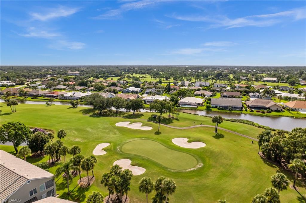 13180 Hamilton Harbour Drive, Unit E1 Naples, FL 34110 - Photo 28 of 30 Serene, golf-side setting!