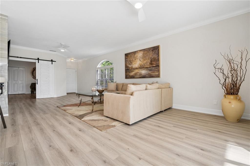 13180 Hamilton Harbour Drive, Unit E1 Naples, FL 34110 - Photo 3 of 30 Stylish custom tile and luxury vinyl flooring.