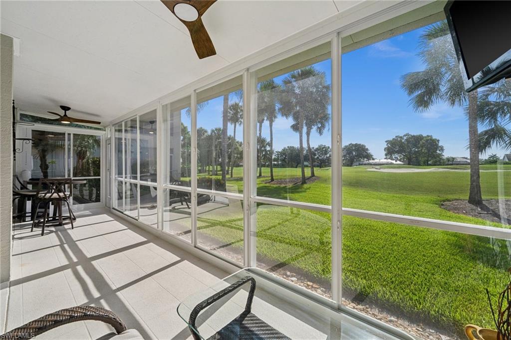 13180 Hamilton Harbour Drive, Unit E1 Naples, FL 34110 - Photo 7 of 30 Lanai fitted with Lexan panels and portable A/C for year-round comfort