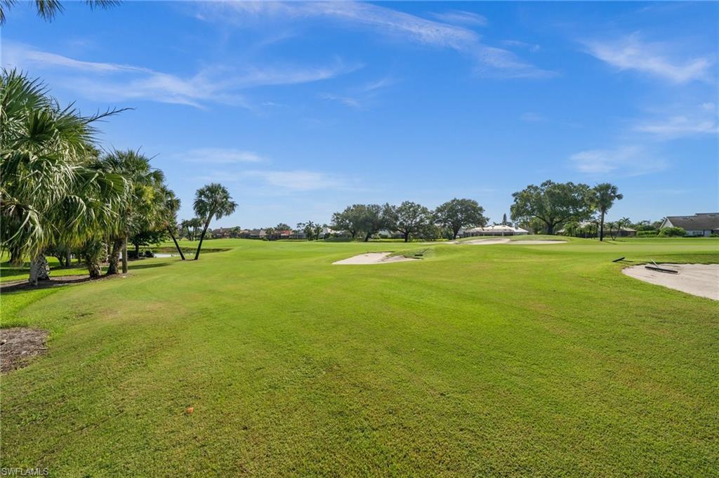 13180 Hamilton Harbour Drive, Unit E1 Naples, FL 34110 - Photo 9 of 30 Relaxing setting with lush surroundings