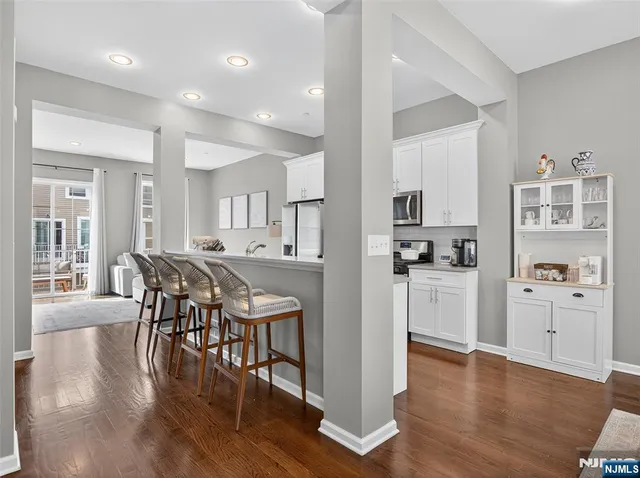 a kitchen with sink and stove