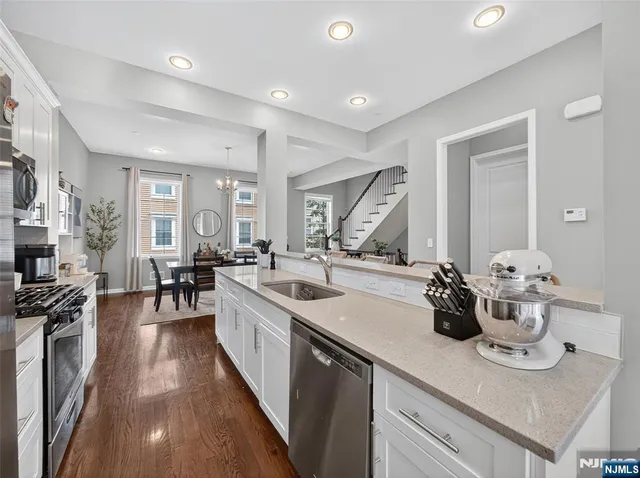 a shelf with cup and plates