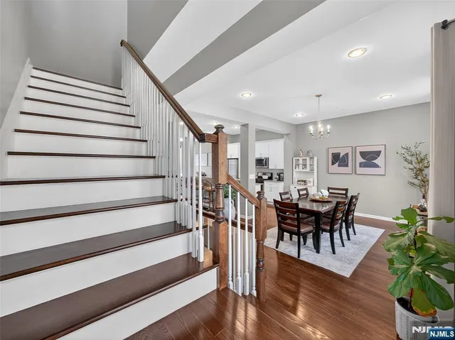 a bedroom with a bed and a lamp