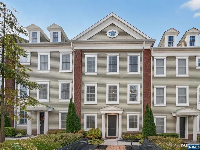 a front view of a building with a windows