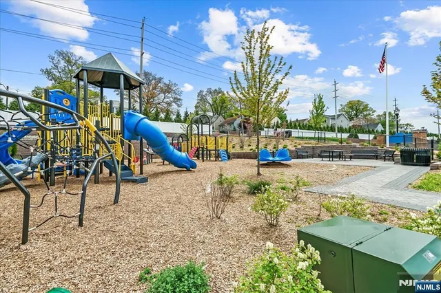 a view of a house with a fountain and a fountain