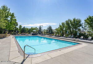 3905 Covington Way, Unit A Reno, NV 89503 - Photo 13 of 28 a view of a swimming pool with an outdoor seating