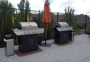 a view of a dinning table and chairs in the patio