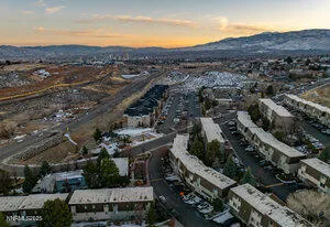 an aerial view of residential houses and outdoor space