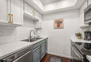 3905 Covington Way, Unit A Reno, NV 89503 - Photo 6 of 28 a view of a kitchen with sink and washing machine