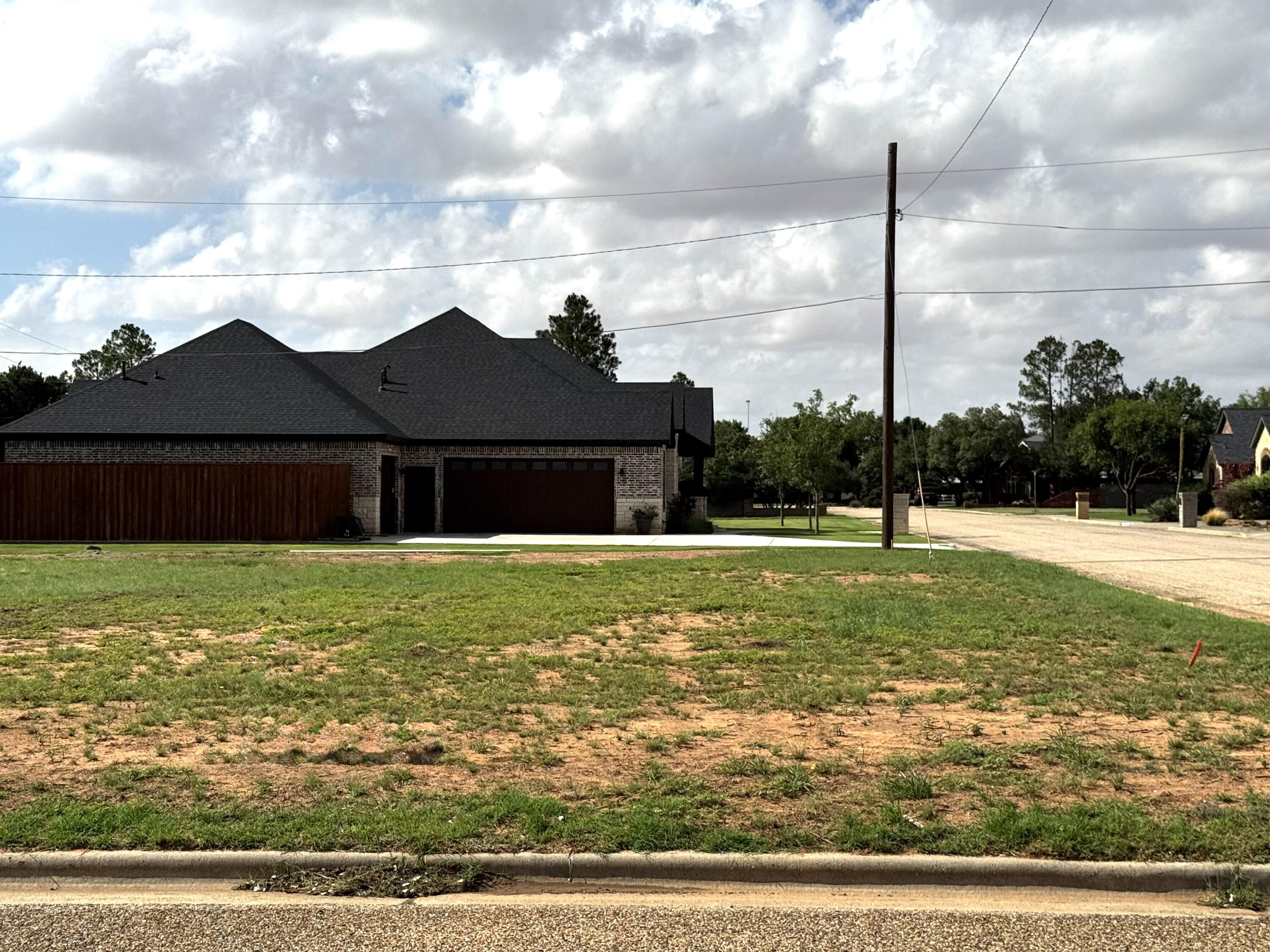 2400 Juniper Drive Lamesa, TX 79331 - Photo 2 of 2 a view of a house with a yard