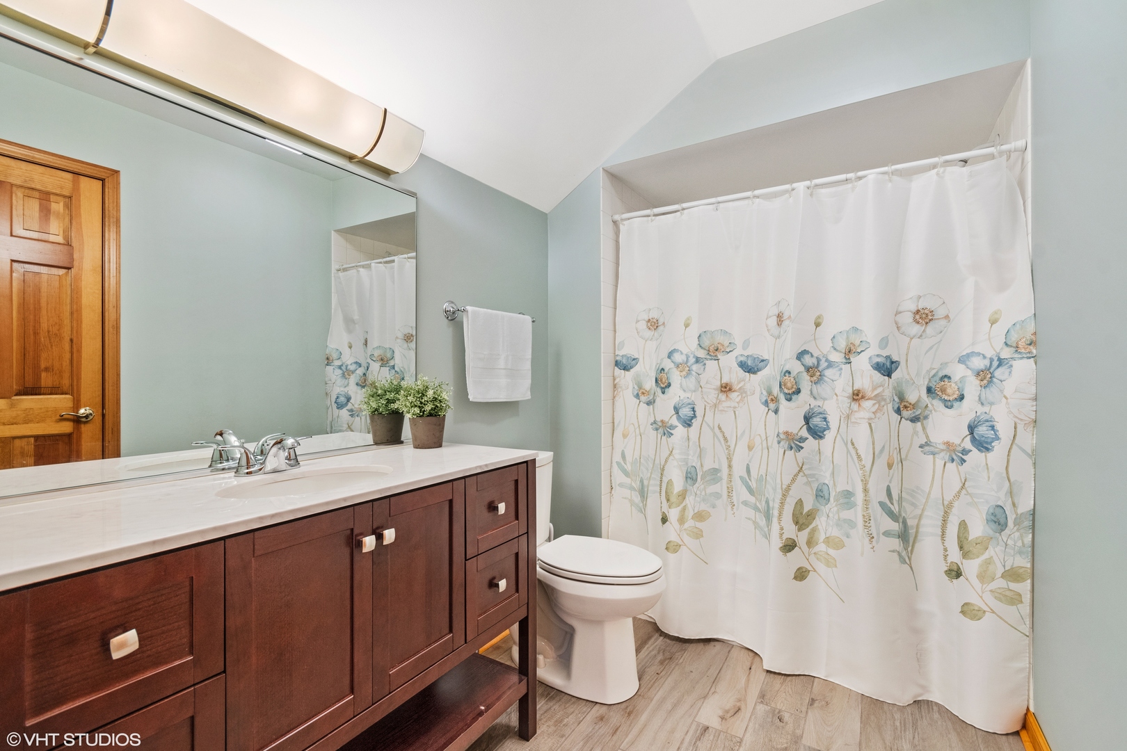 714 Natwill Square Geneva, IL 60134 - Photo 23 of 27 a bathroom with a double vanity sink toilet and shower