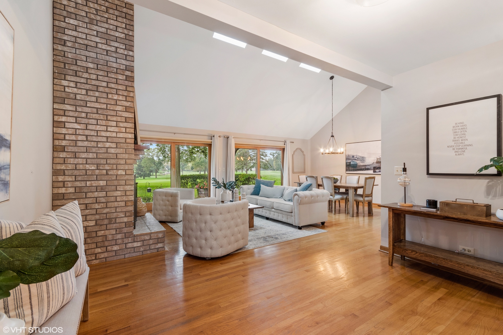 714 Natwill Square Geneva, IL 60134 - Photo 5 of 27 a living room with furniture and a large window