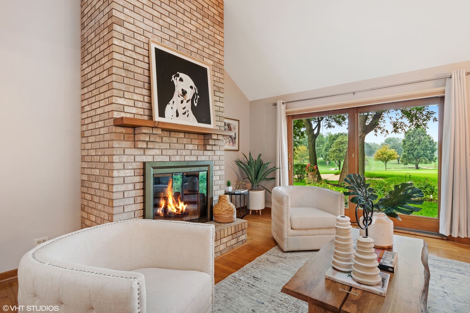 714 Natwill Square Geneva, IL 60134 - Photo 6 of 27 a living room with furniture and a fireplace
