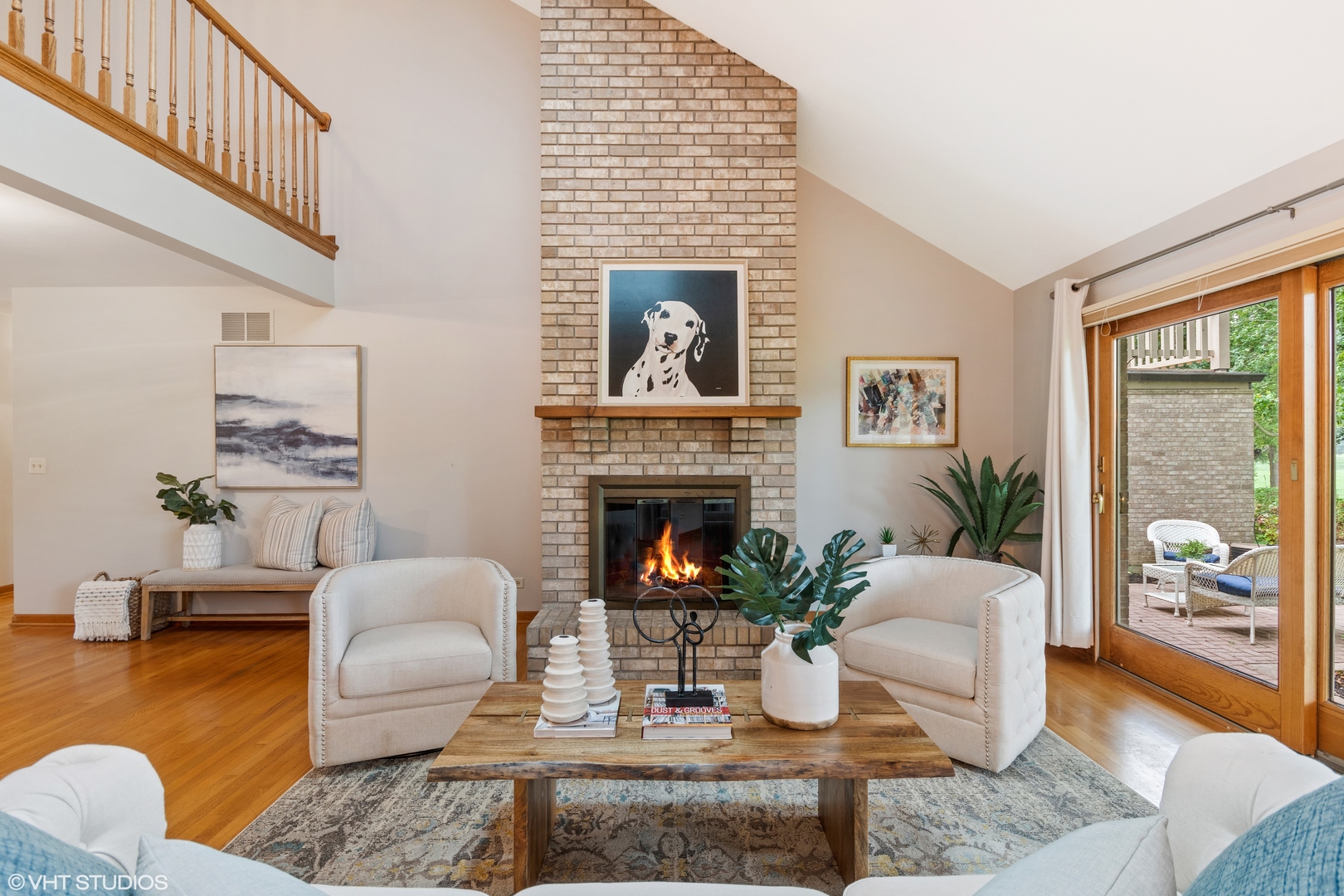 714 Natwill Square Geneva, IL 60134 - Photo 8 of 27 a living room with furniture and a fireplace